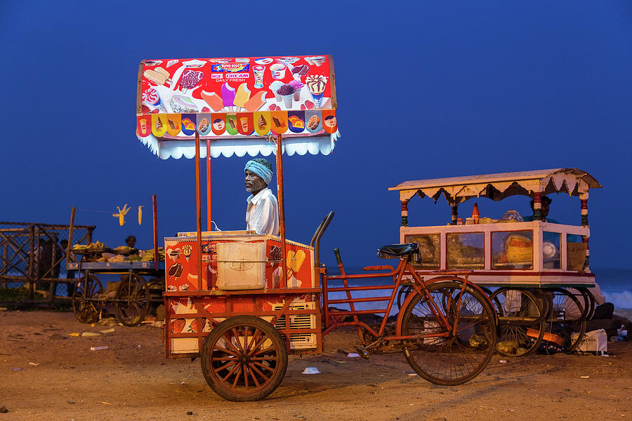 Ice Cream Seller On The Beach At Dusk Photograph by Peter Adams