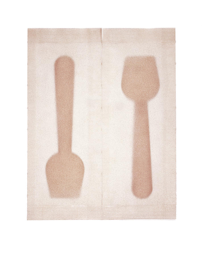 Ice Cream Spoons In Packets Photograph by Peter Dazeley