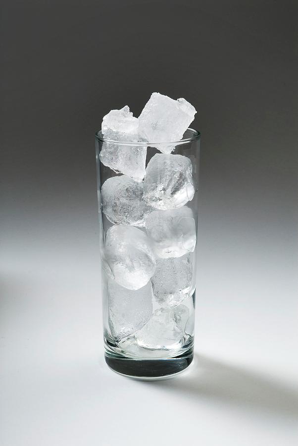 Ice Cubes In A Glass by Trevor Clifford Photography