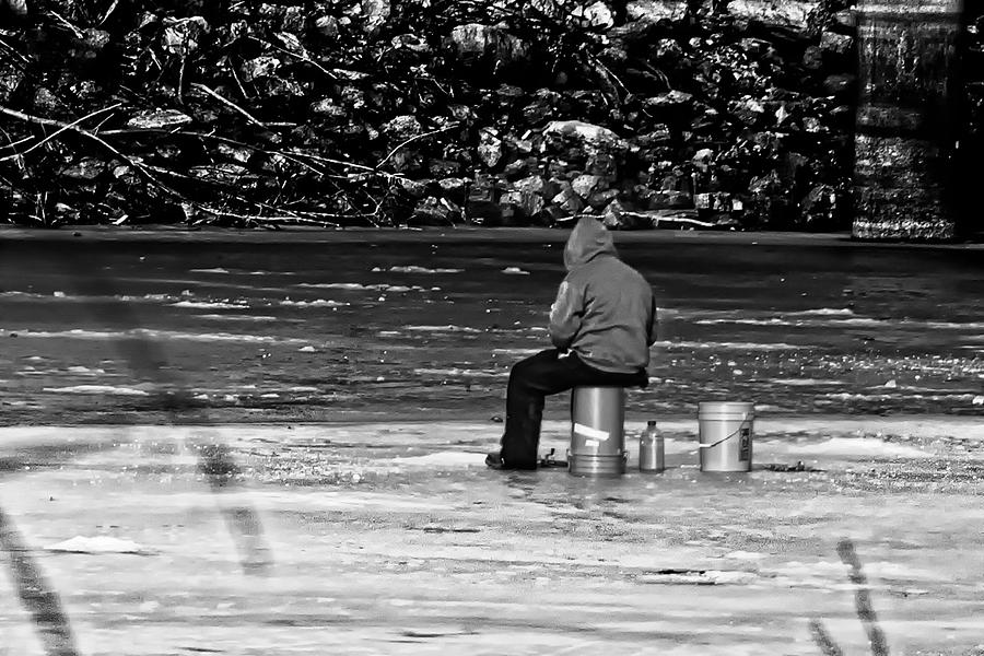 Ice fishing Photograph by Tom Gort
