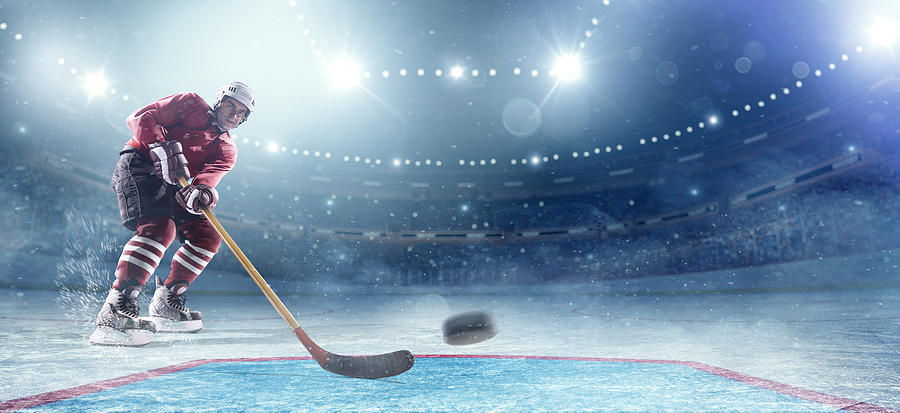 Ice hockey player in action Photograph by Dmytro Aksonov
