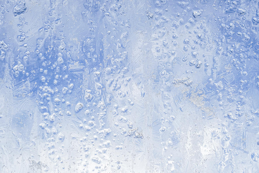 Ice patterns on a window Photograph by © Santiago Urquijo