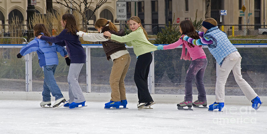 Ice Skaters Photograph by Jim West