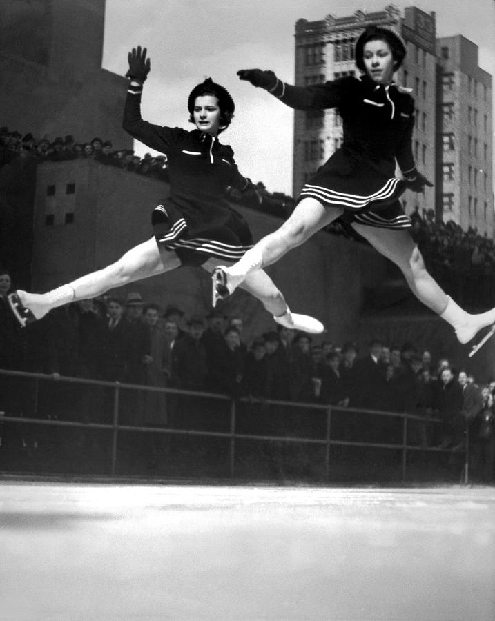 New York City Photograph - Ice Skaters Perform In NY by Underwood Archives