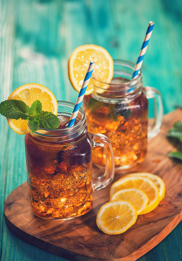 Ice Tea with Lemon and Mint in a Jar Photograph by Kajakiki