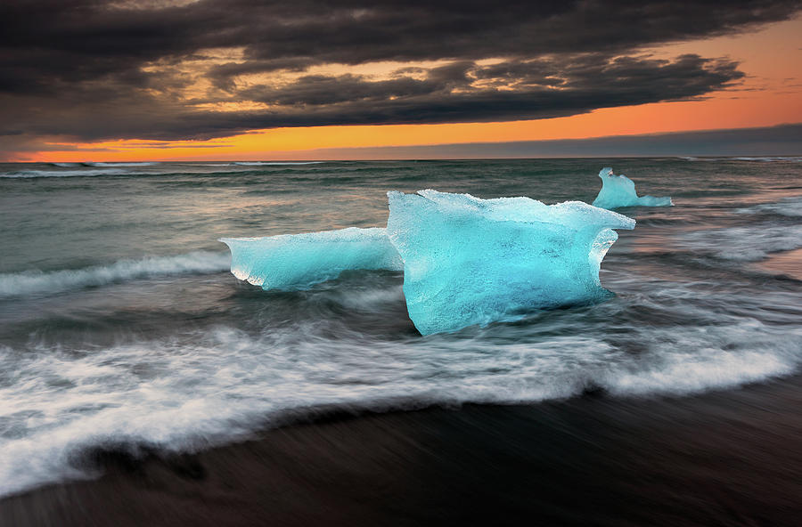 Icebergs At Jokulsarlon Black Sand Photograph by Noppawat Tom Charoensinphon Icebergs At Jokulsarlon Black Sand Photograph by Noppawat Tom Charoensinphon