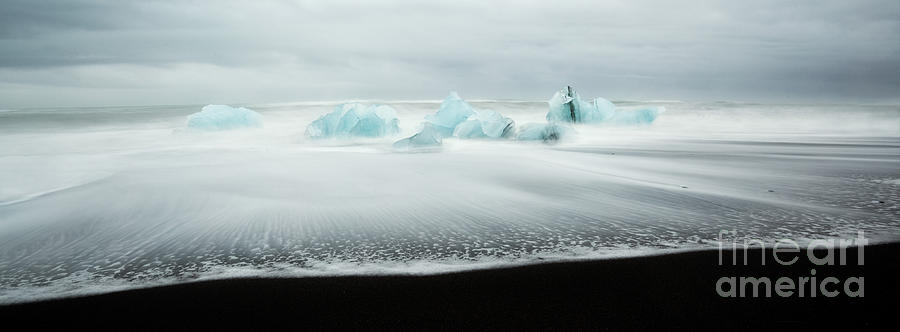 Nature Photograph - Icebergs on black sand beach Iceland by Matteo Colombo
