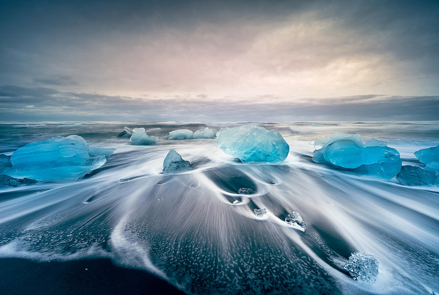 Icebergs on the Jokulsarlon glacial lake Photograph by Daniel Viñé Garcia