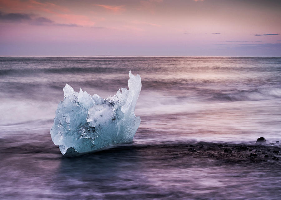 Iceblock On A Beach In Iceland Photograph by Andreas Wonisch