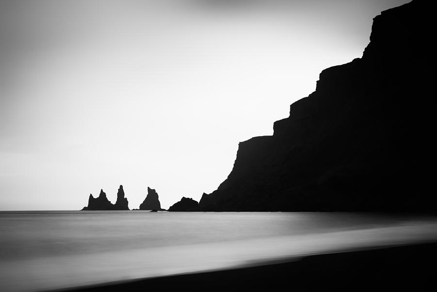 Iceland coast Reynisdrangar minimalist black and white photo Photograph by Matthias Hauser
