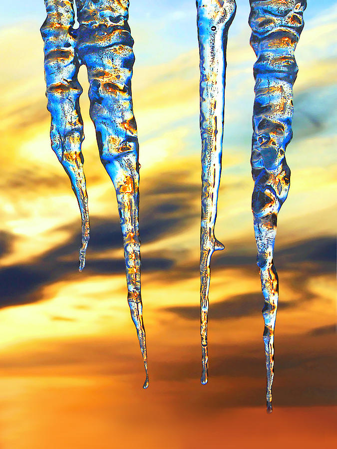 Icicles at sunrise Photograph by Carolyn Derstine