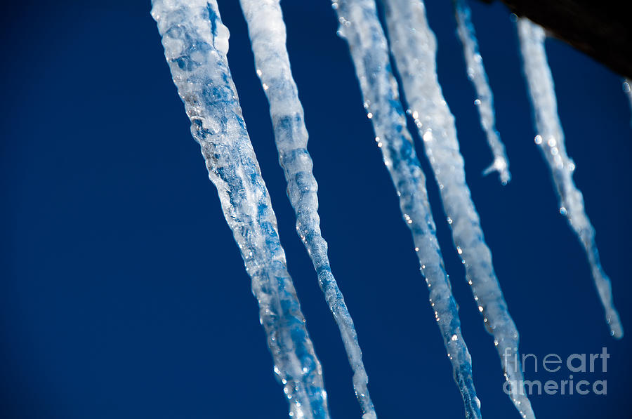 Icicles on a cold metal roof Photograph by Cheryl Baxter
