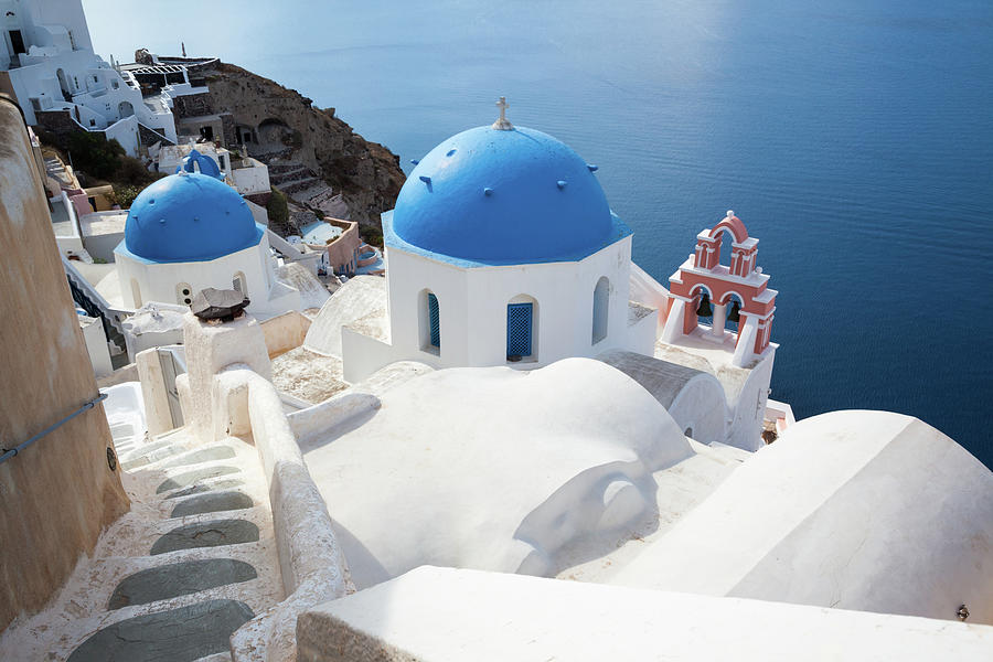Iconic Blue Domed Churches In Santorini Photograph by Matteo Colombo