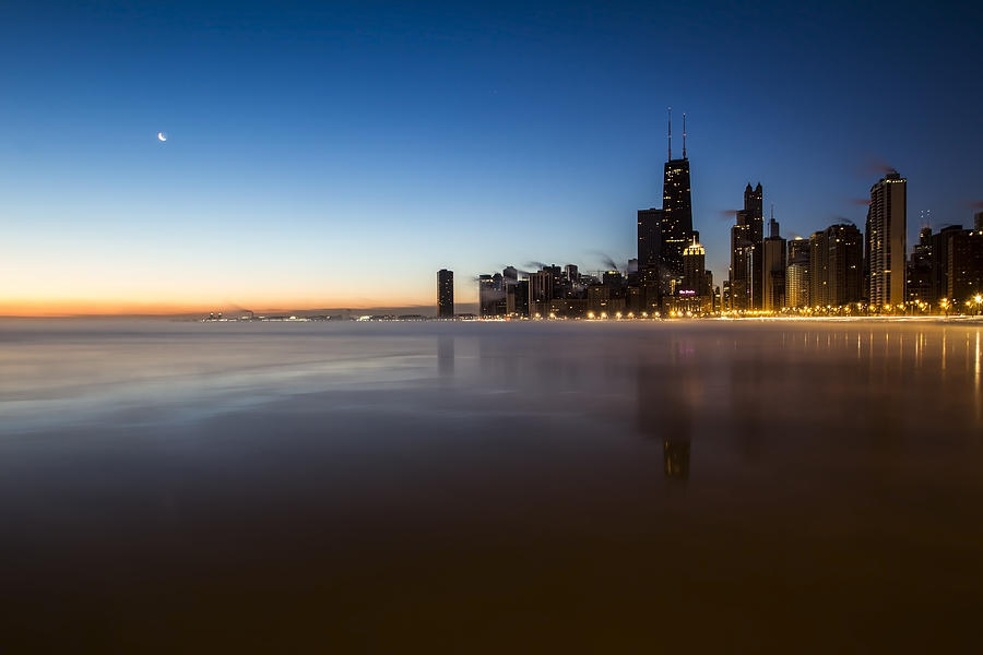 icy crescent moon dawn scene in Chicago Photograph by Sven Brogren