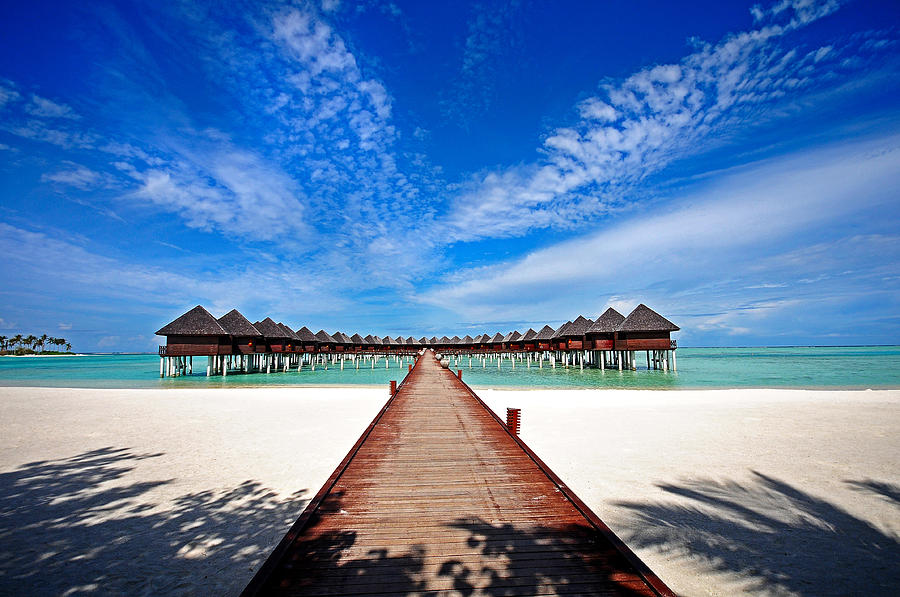 Idyllic Symmetry. Water Villas. Maldives Photograph by Jenny Rainbow