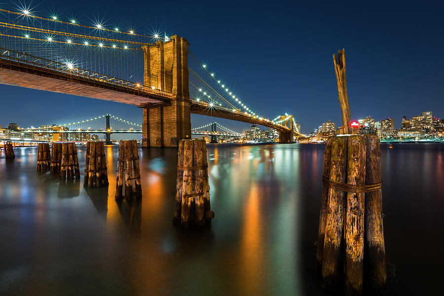 Illuminated Brooklyn Bridge by night Photograph by Mihai Andritoiu