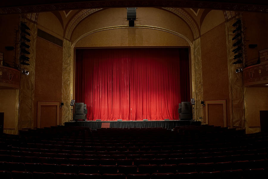 Illuminated empty theatre and stage Photograph by Leonard Mc Lane