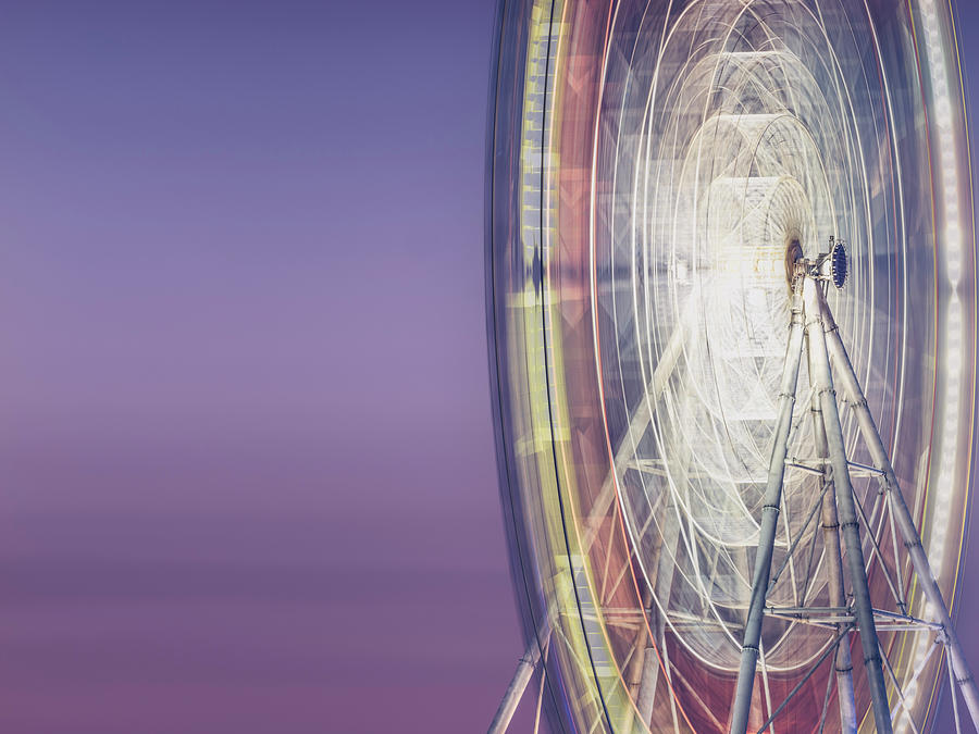 Illuminated Motion Ferris Wheel At Photograph by Aaaaimages