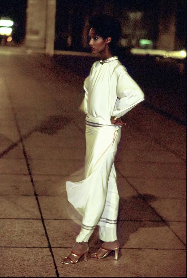 Iman Wearing A Silk Genny Ensemble Photograph by Arthur Elgort