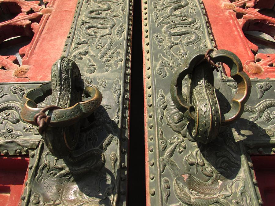 Imperial door knockers Photograph by Alfred Ng