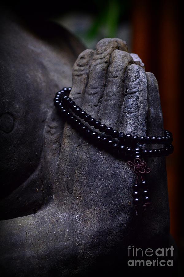 In Buddhas Hand Photograph
