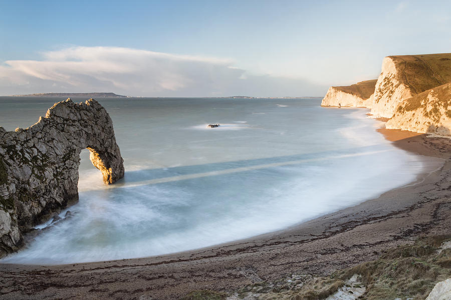 Christmas Photograph - In the Shadow of Durdle Door by Chris Frost