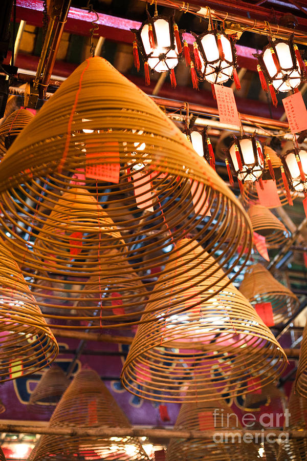 Incense coils hanging inside Man Mo temple Hong Kong Photograph by Matteo Colombo
