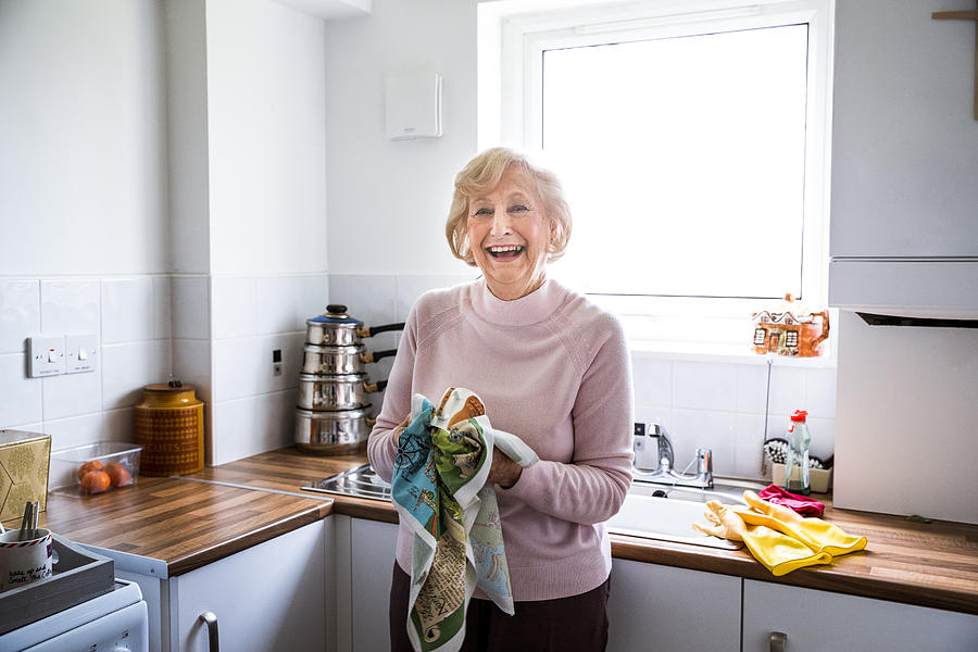 Independent Senior Woman in her Kitchen Photograph by SolStock
