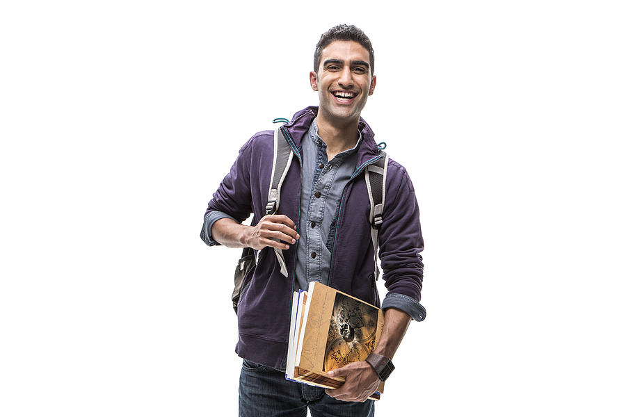 Indian student carrying books and backpack Photograph by Kyle Monk
