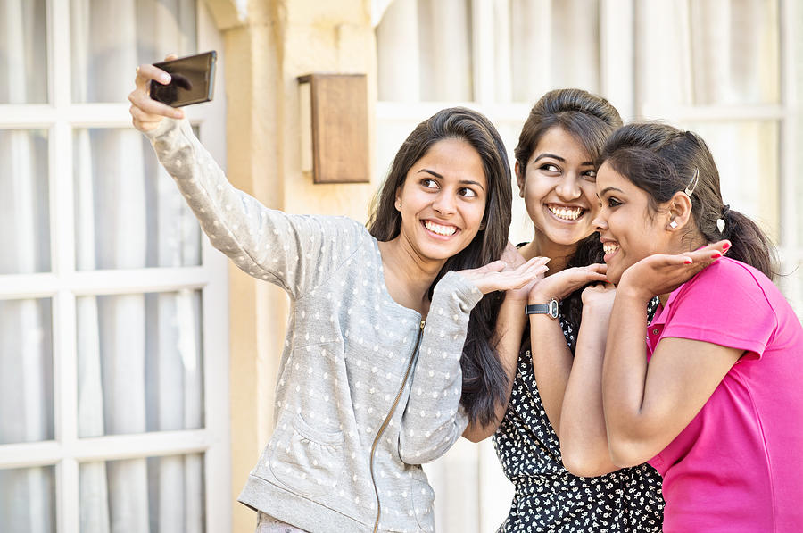 Indian teenager girls taking a selfie Photograph by Nikada