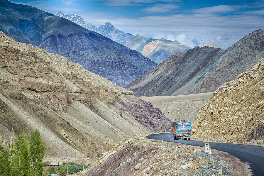 Indian truck on the Srinagar-Leh highway in Ladakh, India Photograph by Guenterguni