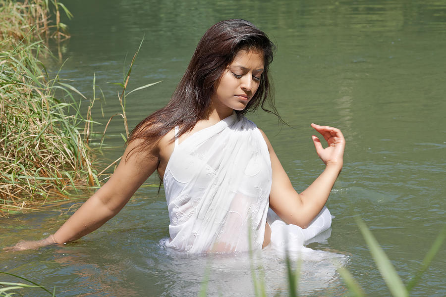 Indian Woman In The Water With A White Sari Photograph by Visual7