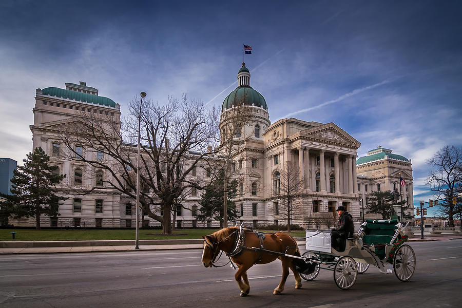 Indiana Capital Building - Front with Horse Passing Photograph by Ron Pate
