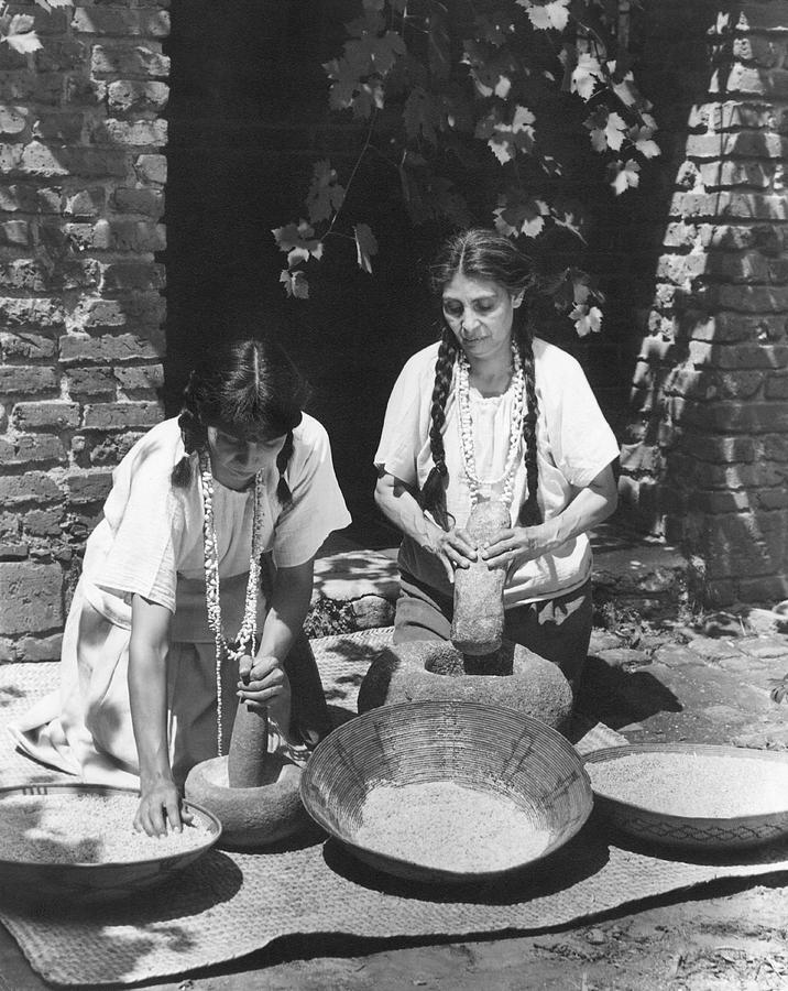 Native American Photograph - Indians Using Mortar And Pestle by Underwood Archives Onia