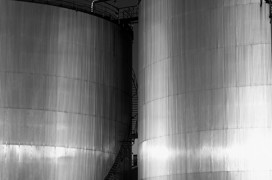 Industry Fuel Tanks At Sunset Photograph by Christian Lagereek