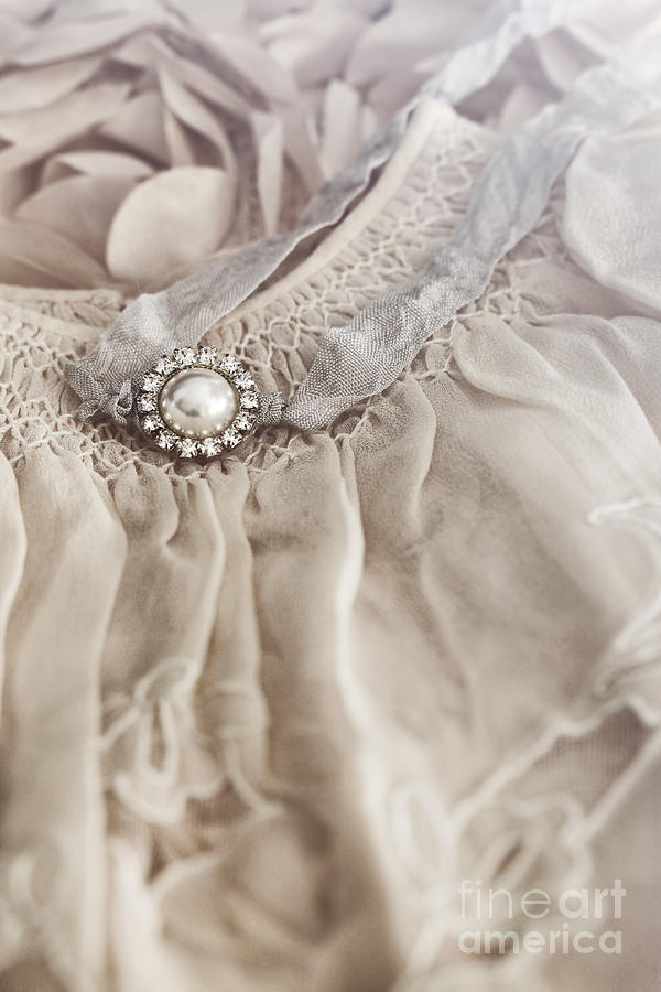 Infant dress with small pearl jewelery Photograph by Sandra Cunningham
