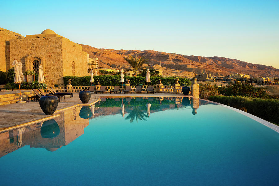 Mountain Photograph - Infinity Pool In Resort Near Dead Sea by Leslie Parrott