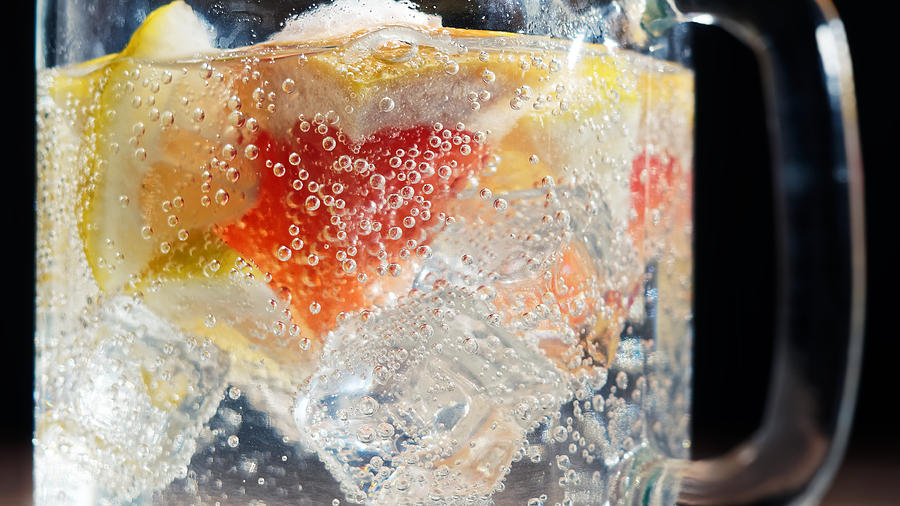 Infused water close-up Photograph by Invizbk