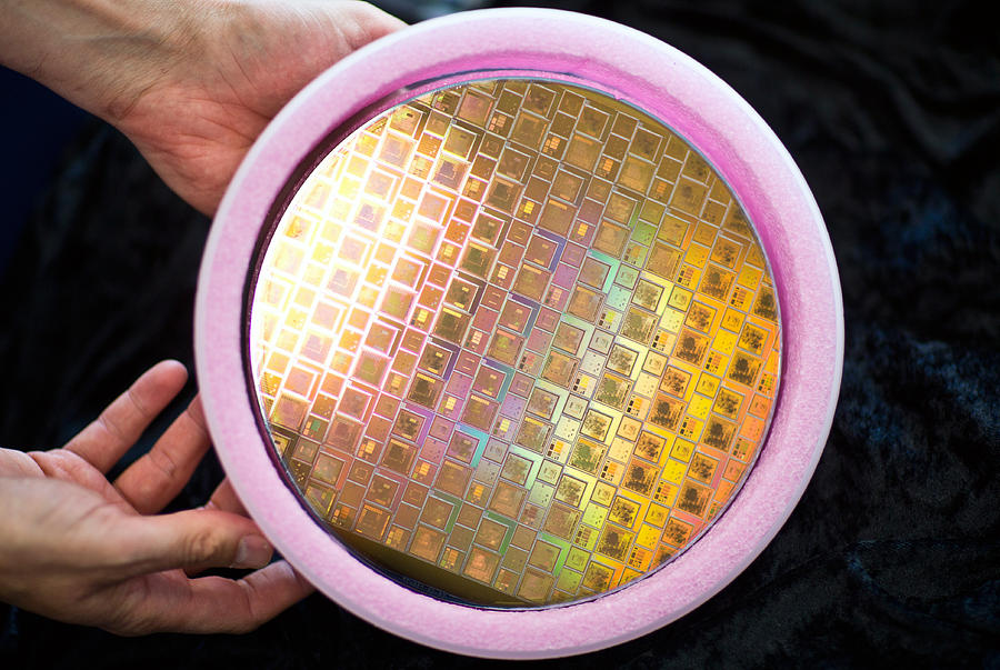 Integrated Circuits On Silicon Wafer Photograph by Science Source
