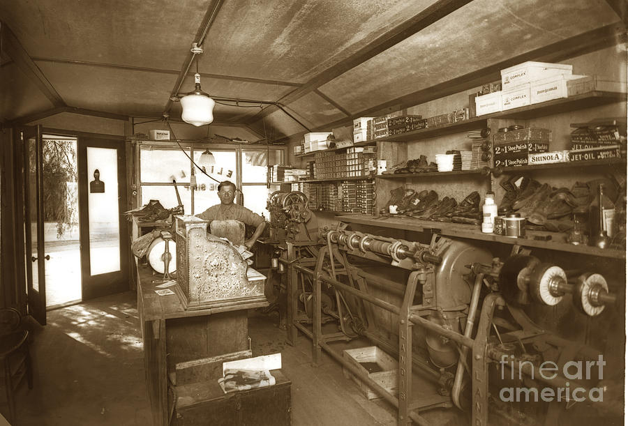 Interior Photograph - Interior of the Elialle Shoe Repair Shop circa 1920 by Monterey County Historical Society