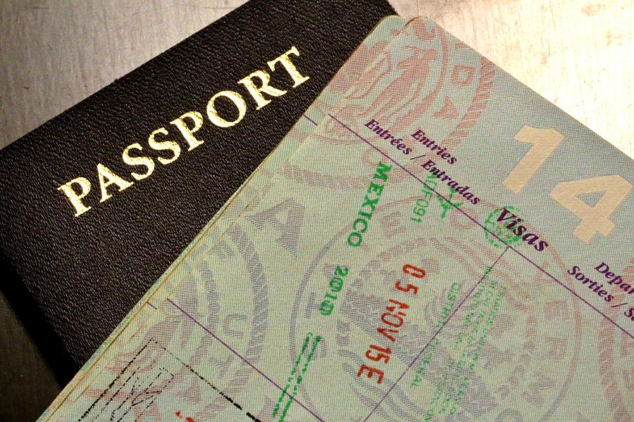 International Passport documents Photograph by Douglas Sacha