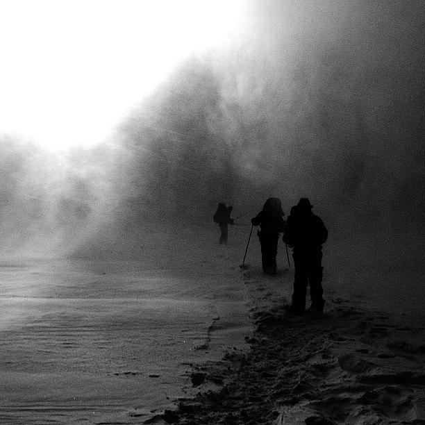 Mountain Photograph - Into The Abyss. Walking Across Frozen by Kurt Von Weisenstein