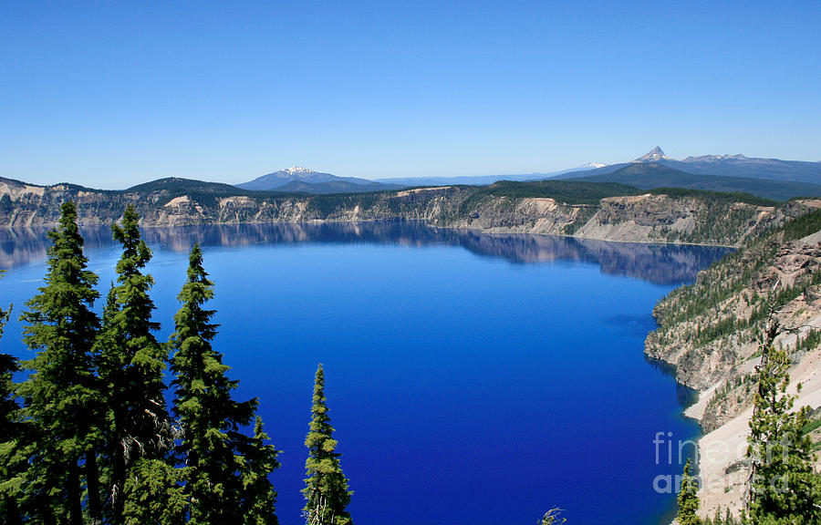 Into the blue of Crater Lake Photograph by David Millenheft