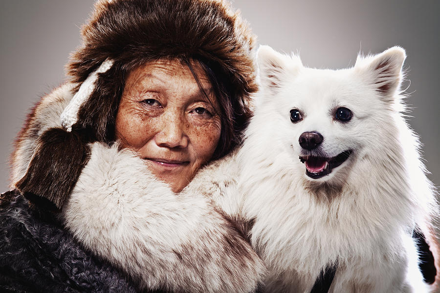 Inuit Woman and dog Photograph by Filadendron