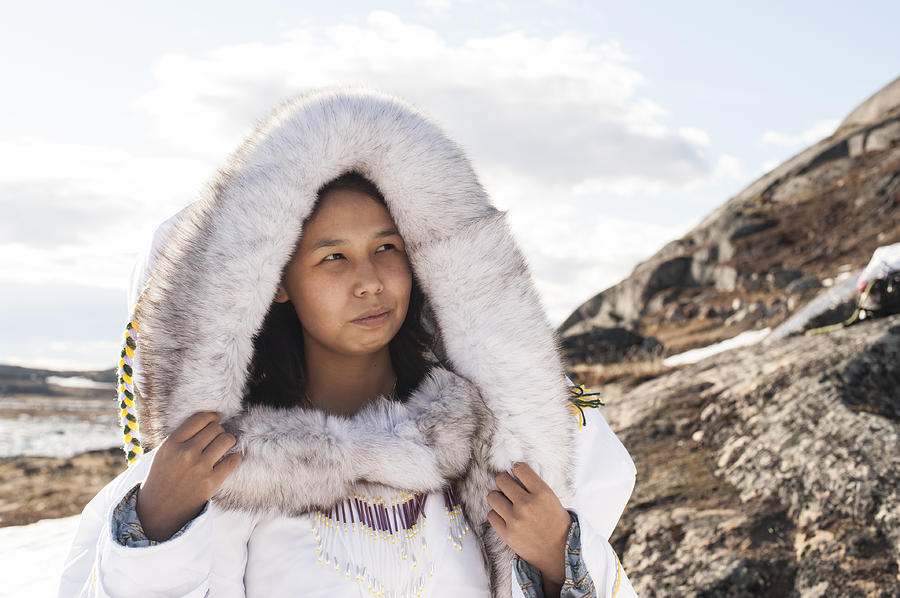 Inuit Woman on the Tundra of Baffin Island, Nunavut, Canada. Photograph by RyersonClark