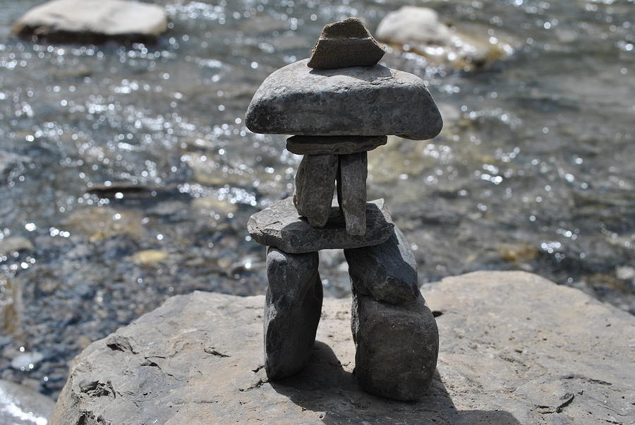 Inukshuk by the water Photograph by Jim Hogg