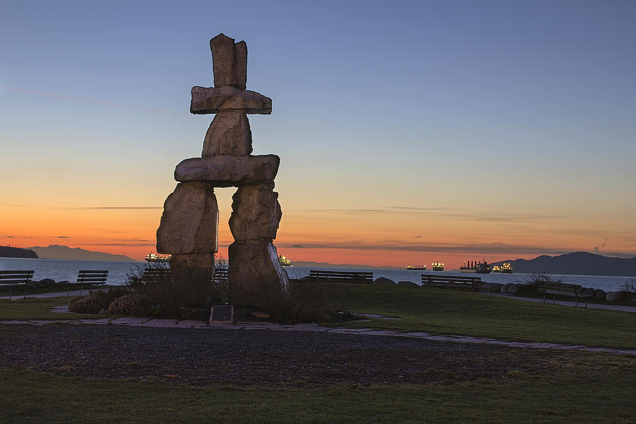 Sunset Photograph - Inukshuk Stone Sculpture Sunset Beach Vancouver BC at Sunset by Jit Lim