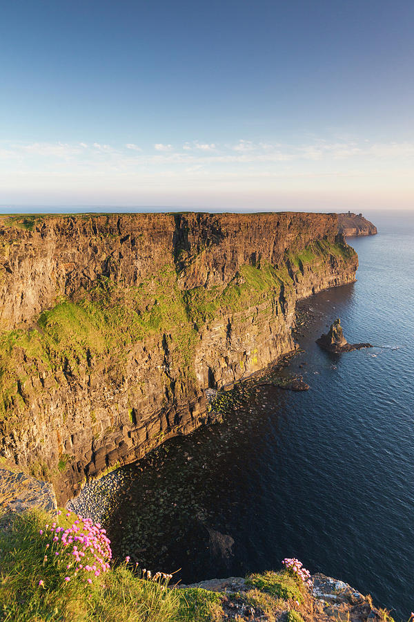 Sunset Photograph - Ireland, County Clare, Cliffs Of Moher by Walter Bibikow