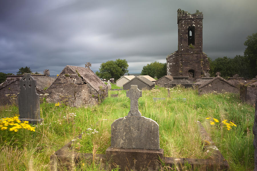 Architecture Photograph - Irish graveyard cemetary dark clouds by Dirk Ercken