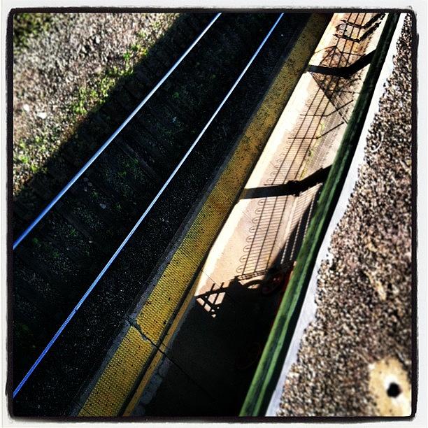 Iron Shadows #traintracks #ironfence Photograph by Monica Wilson
